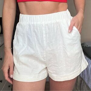 White linen shorts with pockets